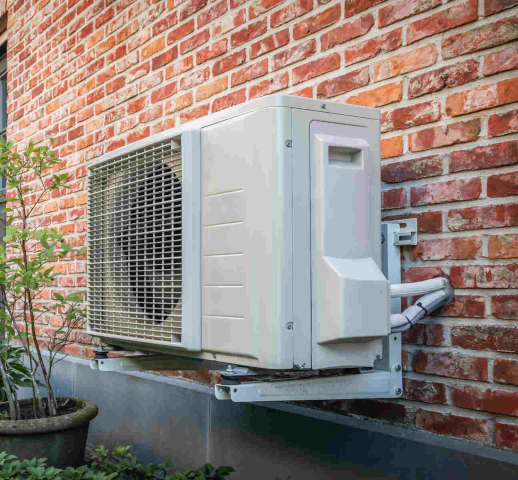 Professional technician checking refrigerant pressure and airflow during detailed HVAC inspection